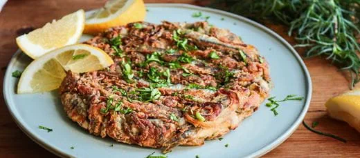 recipe image Лепешка «Бегото» с рыбой и луком